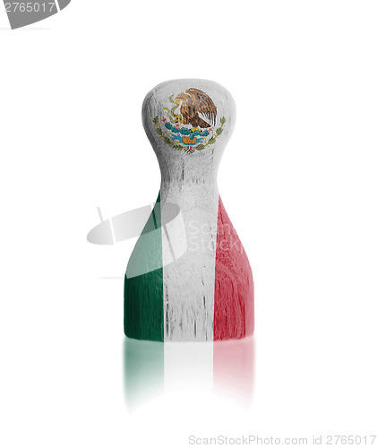 Image of Wooden pawn with a flag painting