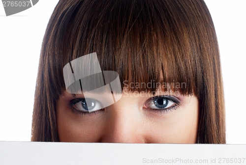 Image of Girl behind white board