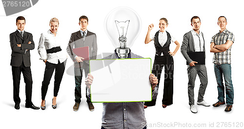 Image of Business Team With Lamp Head