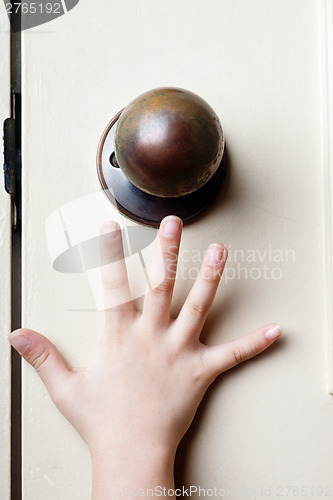 Image of Reaching for door knob