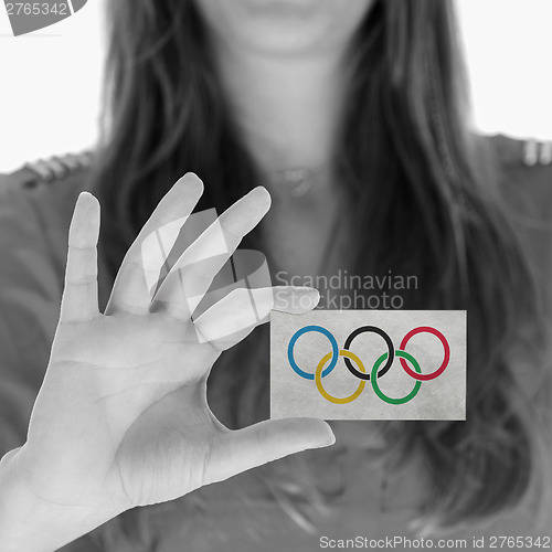 Image of Woman showing a business card