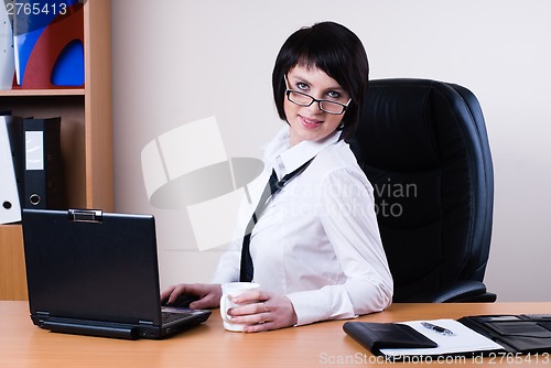 Image of Business woman with laptop