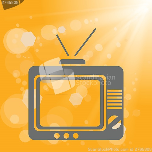 Image of old tv on a yellow background