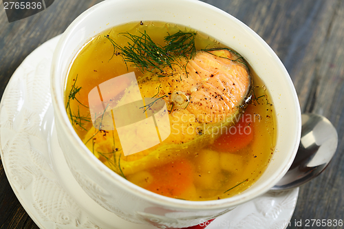 Image of Soup with trout close up. 