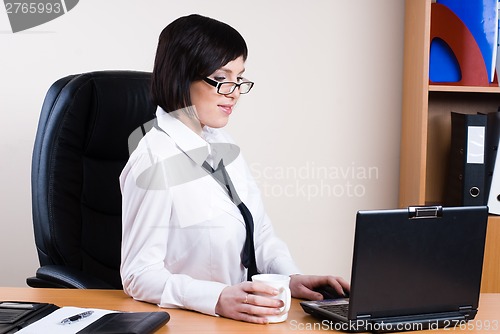Image of Business woman with laptop