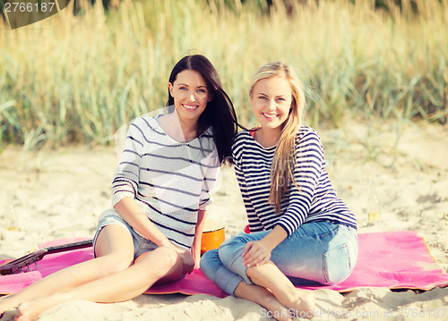 Image of beautiful teenage girls or young women having fun