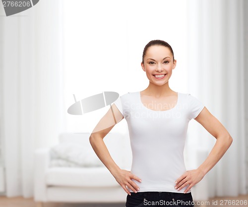 Image of smiling woman in blank white t-shirt