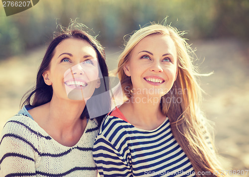 Image of beautiful teenage girls or young women having fun