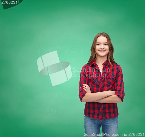 Image of smiling young woman in casual clothes