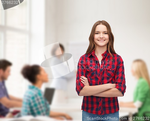 Image of smiling young woman in casual clothes