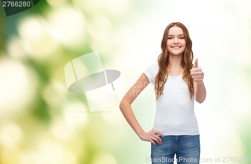 Image of smiling teenager in blank white t-shirt