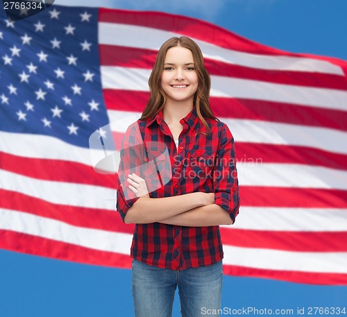 Image of smiling young woman in casual clothes