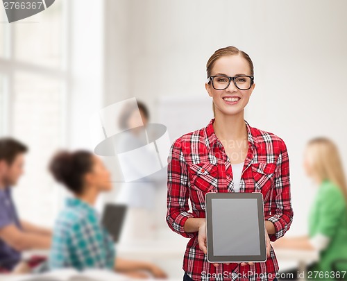 Image of smiling girl with blank tablet pc screen