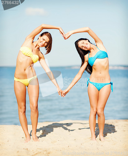 Image of girls having fun on the beach