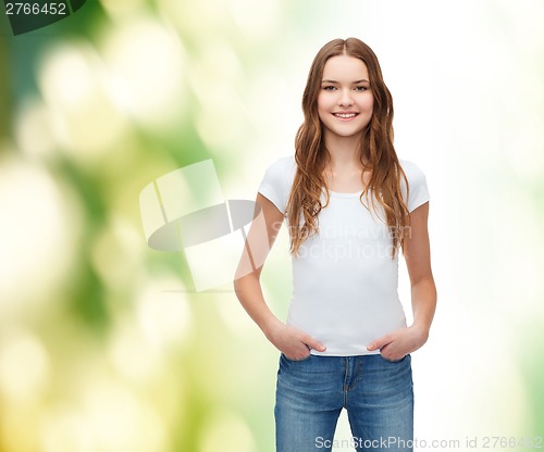 Image of smiling teenager in blank white t-shirt