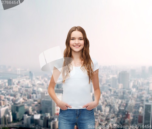 Image of smiling teenager in blank white t-shirt