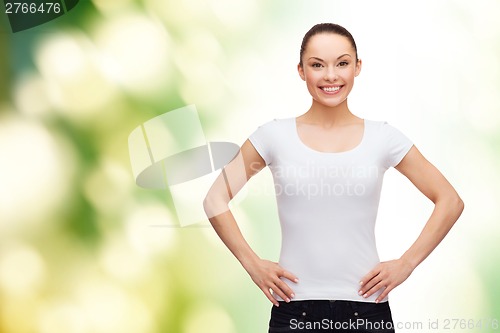 Image of smiling woman in blank white t-shirt