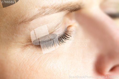 Image of middle age woman eye macro