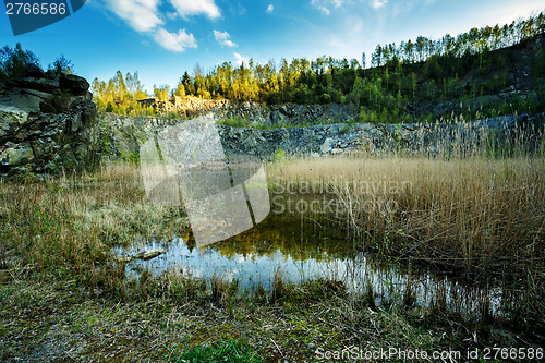 Image of small flooded quarry