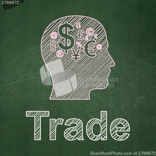 Image of Finance concept: Head With Finance Symbol and Trade on chalkboard background