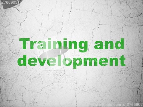 Image of Education concept: Training and Development on wall background