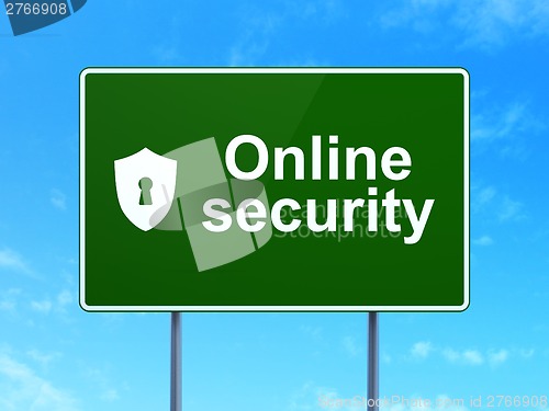 Image of Safety concept: Online Security and Shield With Keyhole on road sign background