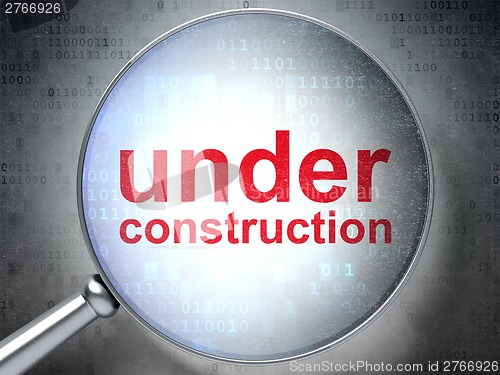 Image of SEO web development concept: Under Construction with optical glass