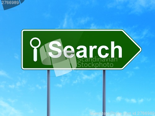 Image of Web development concept: Search and Search on road sign background