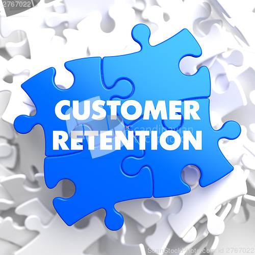 Image of Customer Retention on Blue Puzzle.