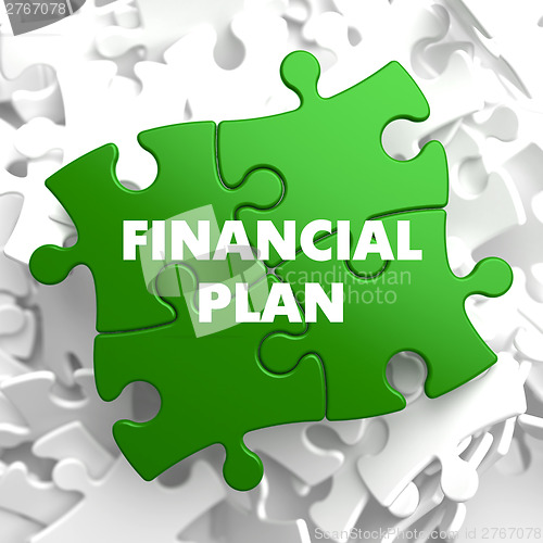 Image of Financial Plan on Green Puzzle.