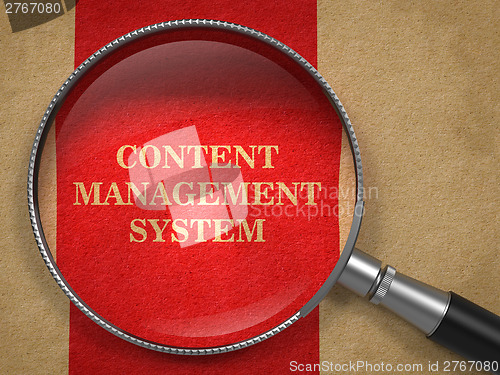 Image of Content Management System Through Magnifying Glass.