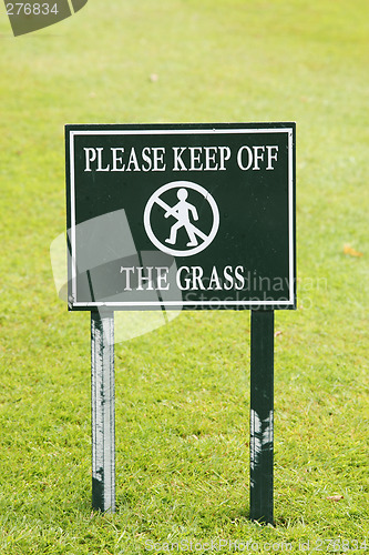 Image of please keep off the grass sign taken in england july 2007