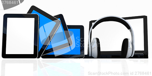 Image of headphones on the  laptop and  tablet pc