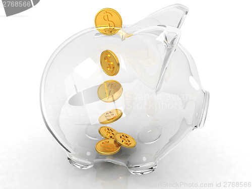 Image of glass piggy bank and falling coins