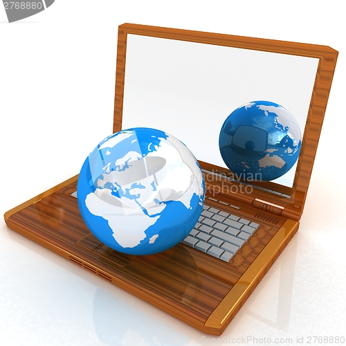 Image of Eco Wooden Laptop and Earth