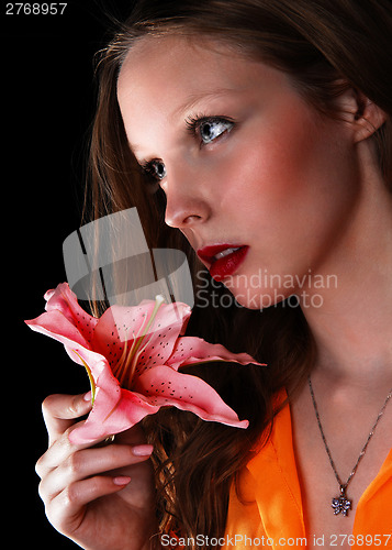 Image of Pretty girl with lily.