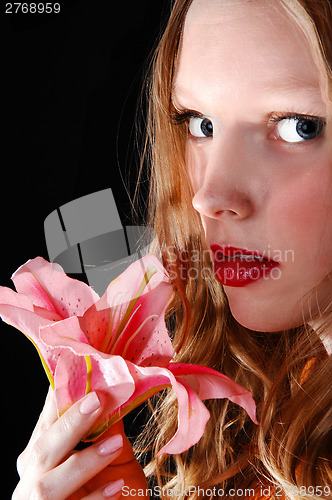 Image of Girl with pink lily.