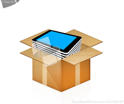 Image of tablet pc in cardboard box