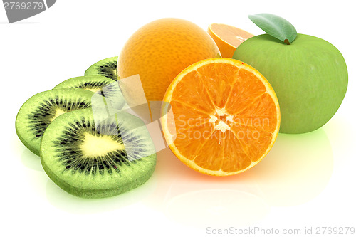 Image of slices of kiwi, apple, orange and half orange
