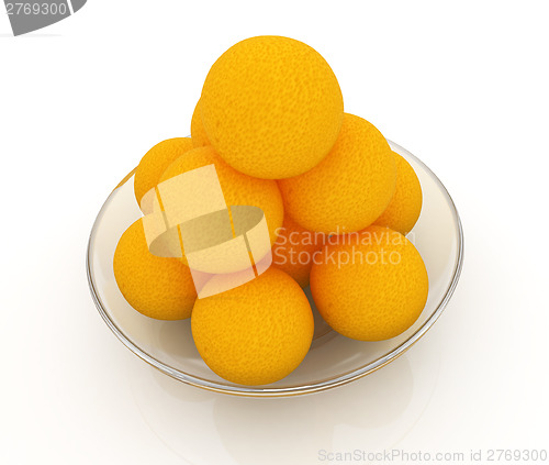 Image of Oranges on a glass plate