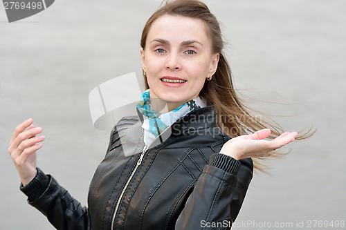 Image of Woman in a black leather jacket