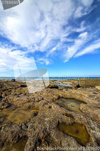 Image of light  beach water  in lanzarote  isle foam rock spain 