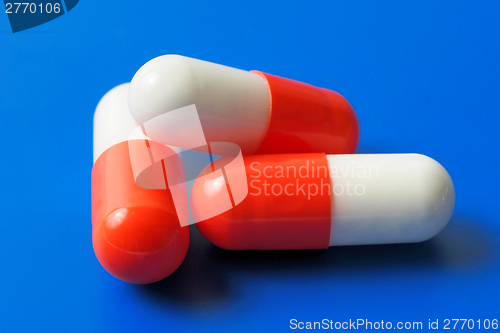 Image of Capsules on blue background