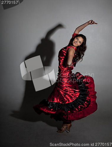 Image of Young woman dancing flamenco