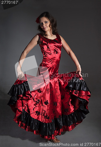 Image of Young woman dancing flamenco