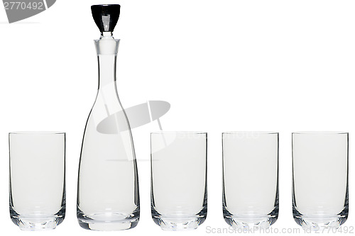 Image of bottle and glass on white