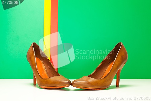 Image of pair of brown high heels