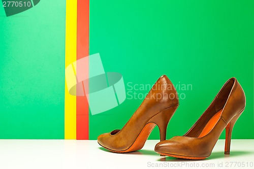 Image of pair of brown high heels