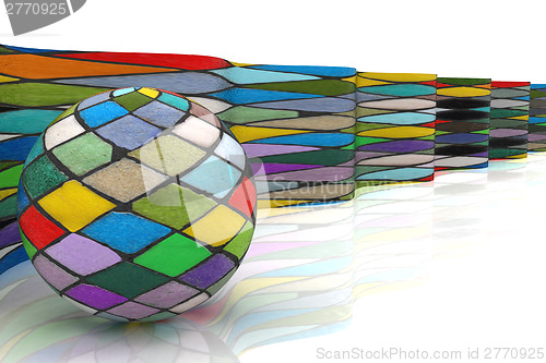 Image of Mosaic ball against the background of colorful waves