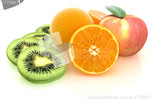 Image of slices of kiwi, apple, orange and half orange